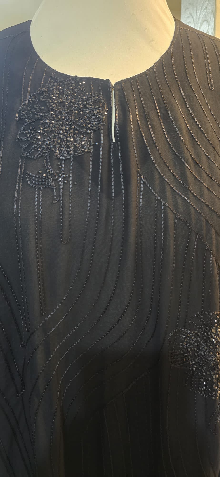 Black Abaya with Floral Shimmer & Textured Wave Detailing