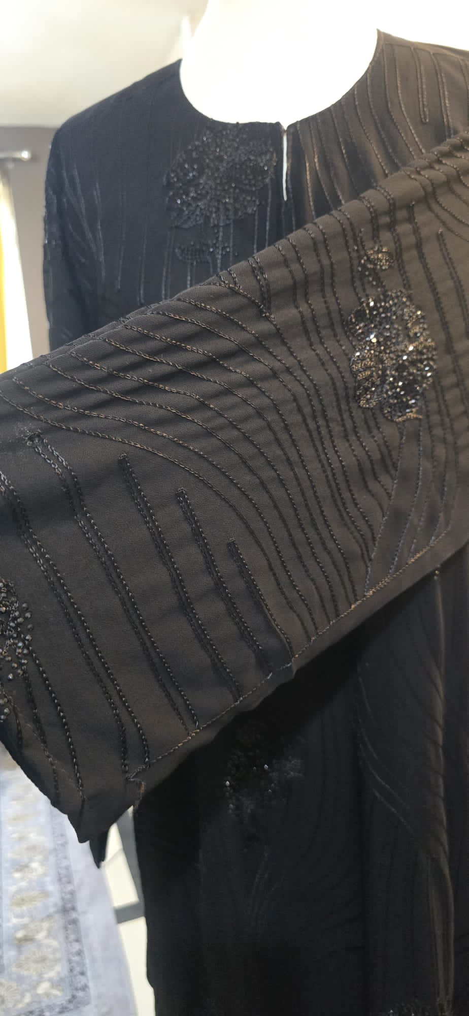 Black Abaya with Floral Shimmer & Textured Wave Detailing